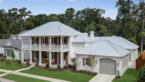 metal roof on a white house|10' white metal roofing.